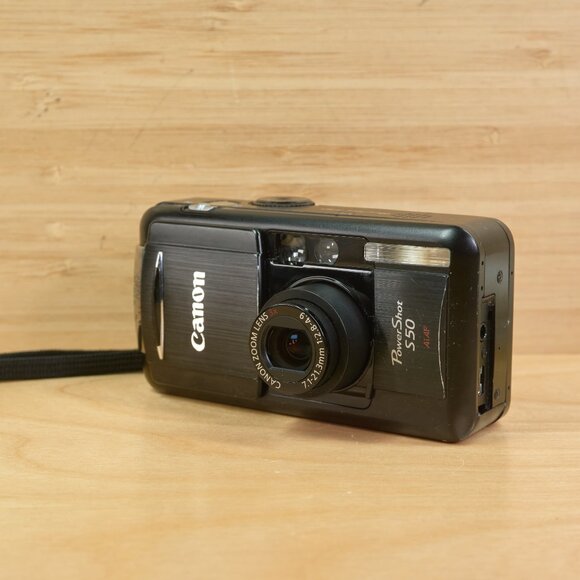 Vintage Canon PowerShot S50 5MP Digital Camera w/ 3x Optical Zoom, Made in Japan - Picture 1 of 11